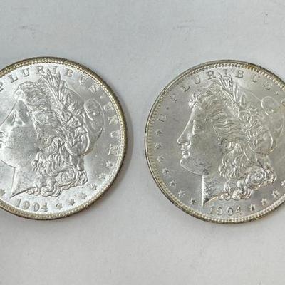 #1320 â€¢ (2) 1904 Morgan Silver Dollars
