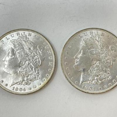 #1322 â€¢ (2) 1904 Morgan Silver Dollars
