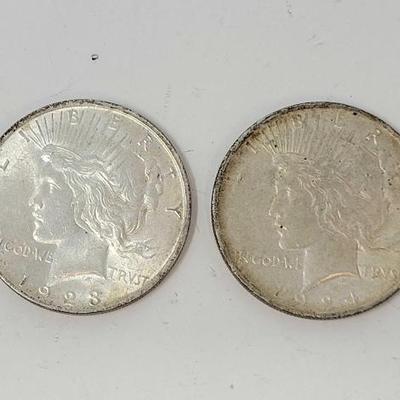 #1306 â€¢ (2) 1923 & 1924 Silver Peace Dollars
