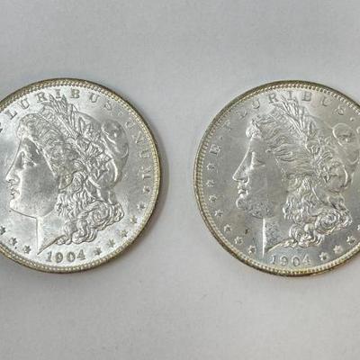 #1310 â€¢ (2) 1904 Morgan Silver Dollars
