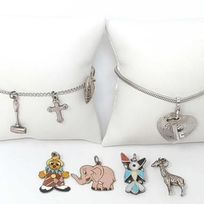 #916 â€¢ Sterling Silver Charm Bracelets and Pendants

