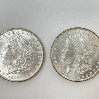 #1328 â€¢ (2) 1904 Morgan Silver Dollars

