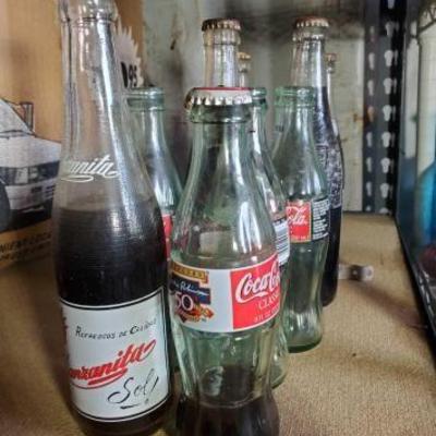 #15572 â€¢ Vintage Soda Bottles and Bottle Opener
