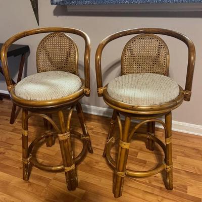 Pair of Vintage Swivel/Cane Back/Rattan Bar Stools. $250.  10.5x35x19. All items available for pre-sale with pre-sale shopping...