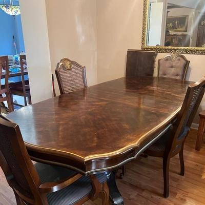 Formal Dining table w/4 chairs and 2 leaves. $750. Pictured with one leave. 90x43.5x31. All items available for pre-sale with pre-sale...