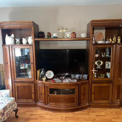 Adjustable Entertainment Console. Glass Doors, Slide out storage. $1500. 110x77x26. All items available for pre-sale with pre-sale...