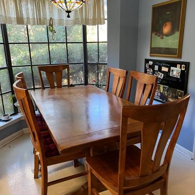 $350 Table w/8 chairs and one 15