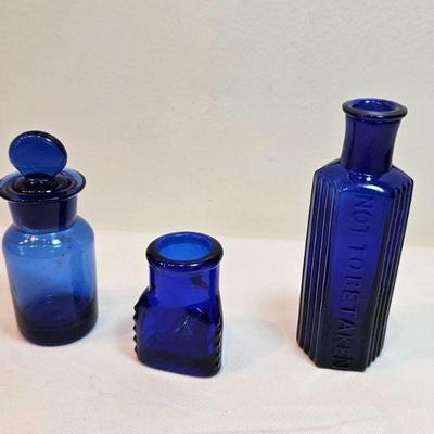 https://www.auctionninja.com/stress-free-estate-services-llc/sales/details/important-collection-advertising-ephemera-glass-bottles-photos...