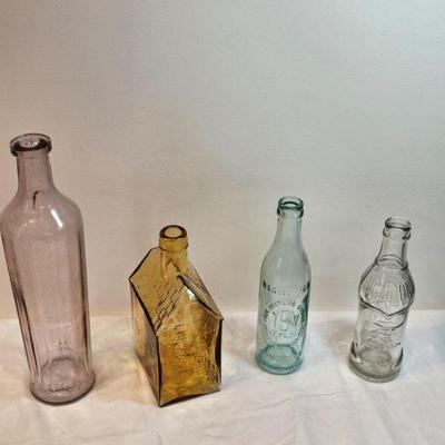https://www.auctionninja.com/stress-free-estate-services-llc/sales/details/important-collection-advertising-ephemera-glass-bottles-photos...