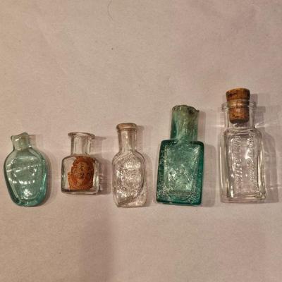 https://www.auctionninja.com/stress-free-estate-services-llc/sales/details/important-collection-advertising-ephemera-glass-bottles-photos...