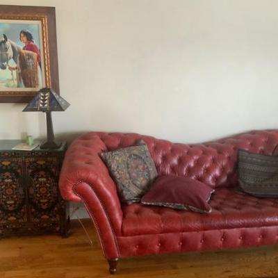 Chesterfield sofa and Asian cabinet