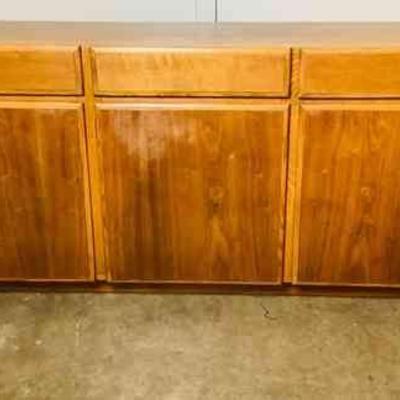 JSHI305 Mid Century Looking Lane Sideboard	Sideboard has 3 Drawers up top and 3 doors below. Â There is some discoloration on the top...