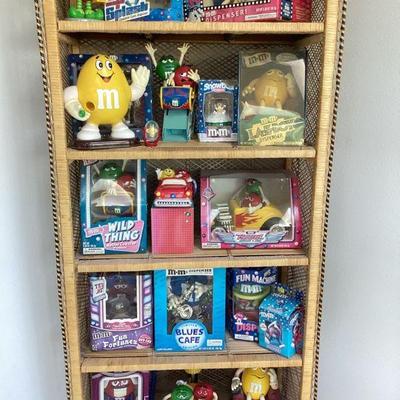 REEM140	Large assortment of all all things M & M's. Dispensers, phone, mugs, decor and more. Collection was displayed for a...