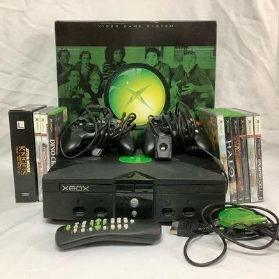 REEM203 Original Xbox Gaming Console With Games	Original Xbox console with 2 controllers. Looks to have all the cords plus the Xbox...
