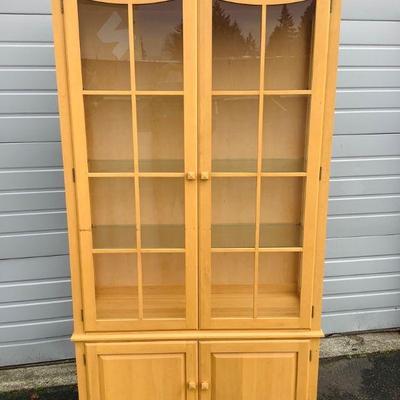 JSHI807 Ethan Allen China Hutch	Ethan Allen brand China hutch. American made wooden hutch with glass shelves. Measures approximately...
