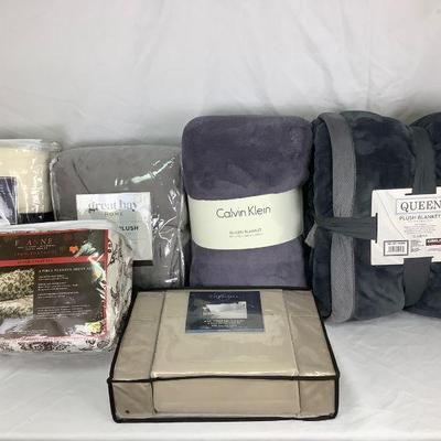 REEM815 New Queen Size Bedspreads	Set of unopened Queen size sheets and blankets. Includes one set of cotton sheets, one set of flannel...