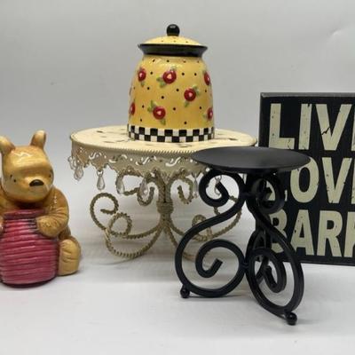1- Ceramic Winnie the Pooh Bank
1- Metal Shabby Chic Display (8.2in W x 5in T)
1- Metal Candle Holder
1- Live Love Bark Sign
1- Ceramic...