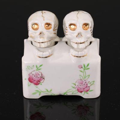 Antique porcelain skull nodder salt & pepper