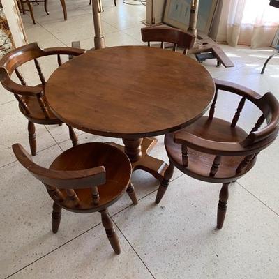 Ranch style solid wood table and chairs. $295.00