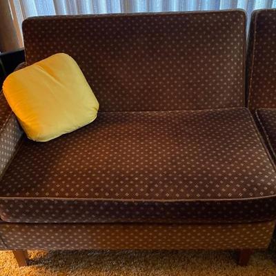 MCM Mad Men Lux velvet sofas pushed together
