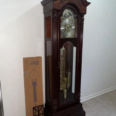 Sligh Grandfather Clock $1200  (one small piece of glass on the left side needs replacement)