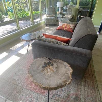 Grey loveseat 34"  and Arhaus petrified wood three legged table 20 X 21 1/2 X 17"