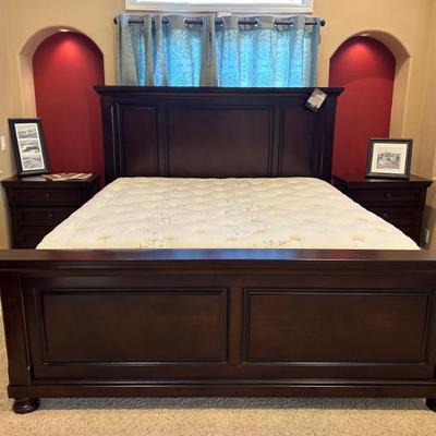 Ashley king bed with matching night stands. 