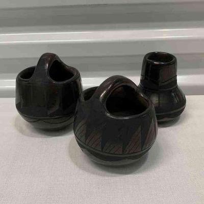 Black on blackware pottery