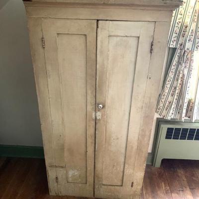 Slender antique two door cupboard