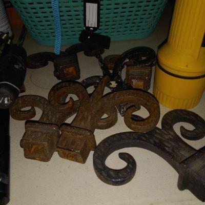 Antique iron fence tops or curtain rid ends