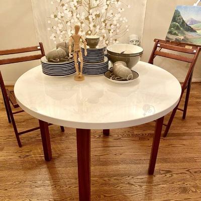 Modern 40 inch round dining room table, white top, wooden legs