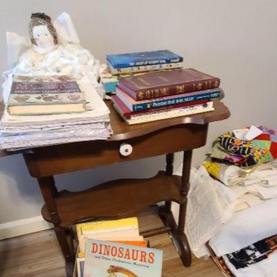 Small Table with Drawer and Vintage Books