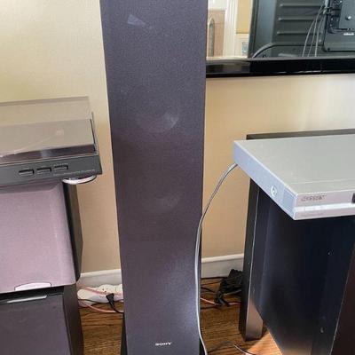 Pair of tall Sony speakers part of the set