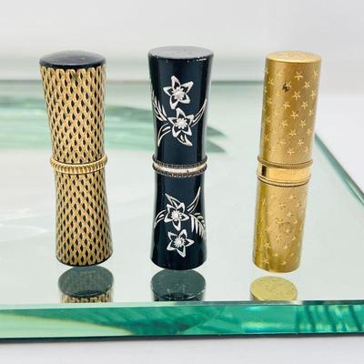 Lot MK #117- Lot of 3 Vintage Lipstick Cases- Black Revlon Hand Engraved, Revlon Futurama, Gold-Tone with Stars  