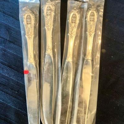 Wallace sterling knives. Pattern - 
Grand Baroque.