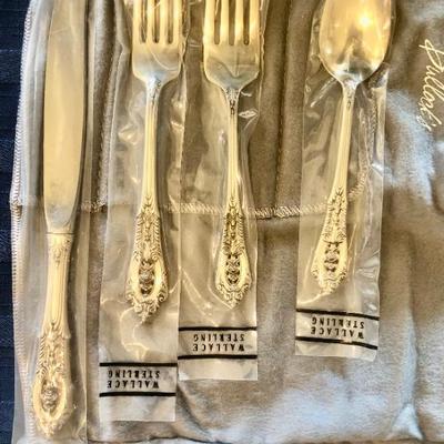 Wallace Sterling four piece place setting. 

Grand Baroque pattern.