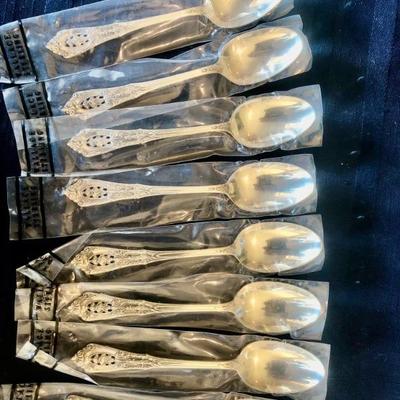 Wallace Sterling teaspoons. Set of eight â€”
 Grand Baroque pattern.