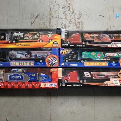#7504 â€¢ (6) Model Nascar Trailer Rigs
