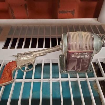 #6172 â€¢ Toy Gun and Pencil Sharper
