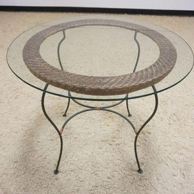 1206	GLASS TOP IRON BASE PATIO TABLE, APPROXIMATELY 36 IN X 30 IN H
