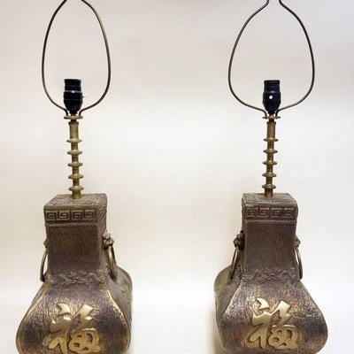 1049	PAIR OF HEAVY BRASS ASIAN DESIGN TABLE LAMPS W/LION HEADS PULLS ON SIDES, APPROXIMATELY 31 1/2 IN HIGH
