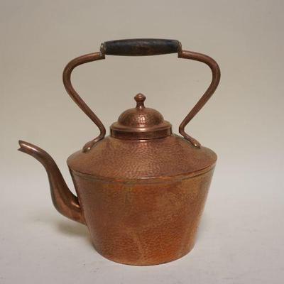 1059	HAND HAMMERED COPPER TEA POT, APPROXIMATELY 12 IN H

