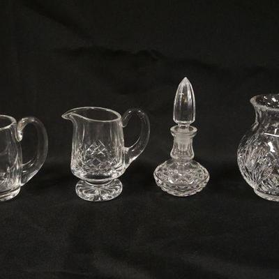 1070	WATERFORD CRYSTAL GROUP OF 4 ASSORTED PIECES,  LARGEST APPROXIMATELY 6 1/2 IN H
