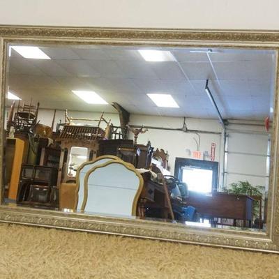 1134	Z GALLERIE BEVELED EDGE HANGING MIRROR IN ORNATE SILVER FINISHED FRAME, APPROXIMATELY 60 IN X 40 IN 
