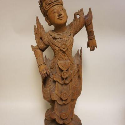 1062	LARGE WOOD CARVED THAI DEITY, APPROXIMATELY 33 IN H

