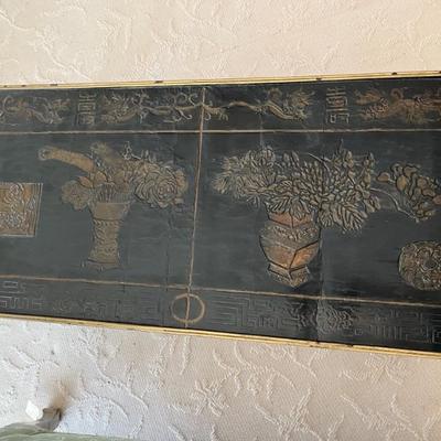 antique Chinoiserie coffee table, black and gold, made from a screen panel