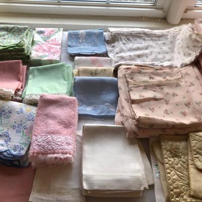 Loads of vintage linensâ€”handkerchiefs, guest towels, sheets, little cocktail napkins, lots are handmade and embroidered, everything you...