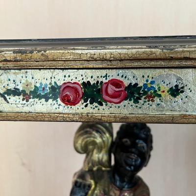 A pair of 19th century Italian hand painted tables with hand painted mirror and glass details and carved wooden blackamoor figures