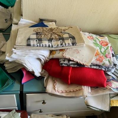 Loads of vintage linensâ€”handkerchiefs, guest towels, sheets, little cocktail napkins, lots are handmade and embroidered, everything you...