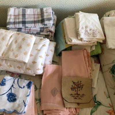 Loads of vintage linensâ€”handkerchiefs, guest towels, sheets, little cocktail napkins, lots are handmade and embroidered, everything you...